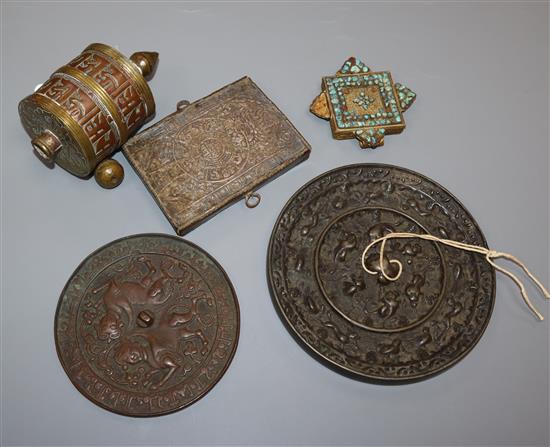A group of Tibetan curiosities including a prayerwheel and mirrors, c.1850-1900